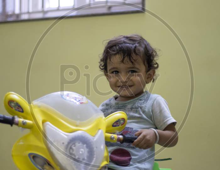 Child Showing A Feeling Of Happiness
