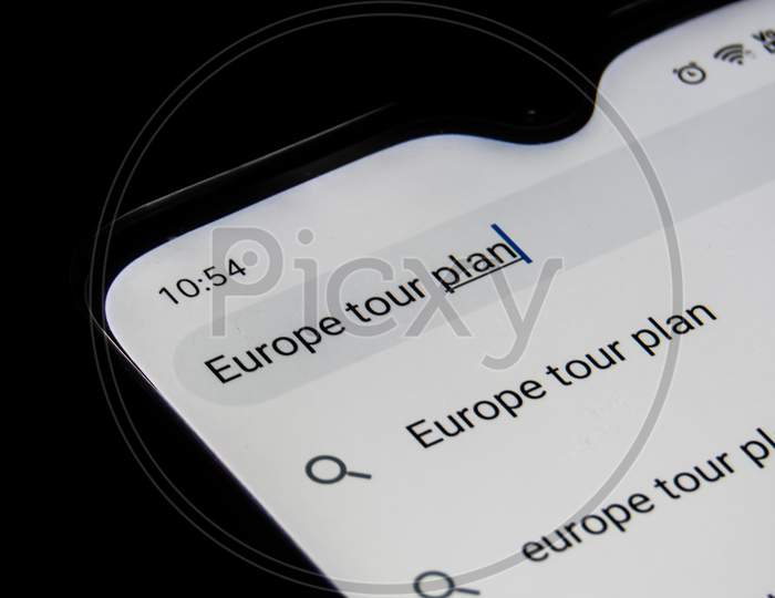 Browsing For Europe Holiday Plan In Mobile Internet.