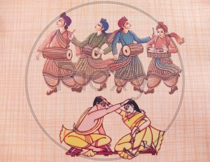 Indian traditional drummers on wedding invitation card.