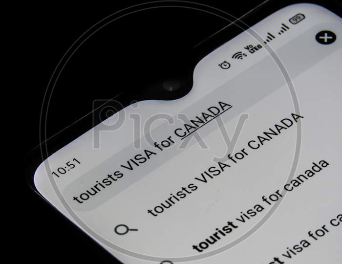 Browsing For Tourist Visa For Canada In Mobile Internet.