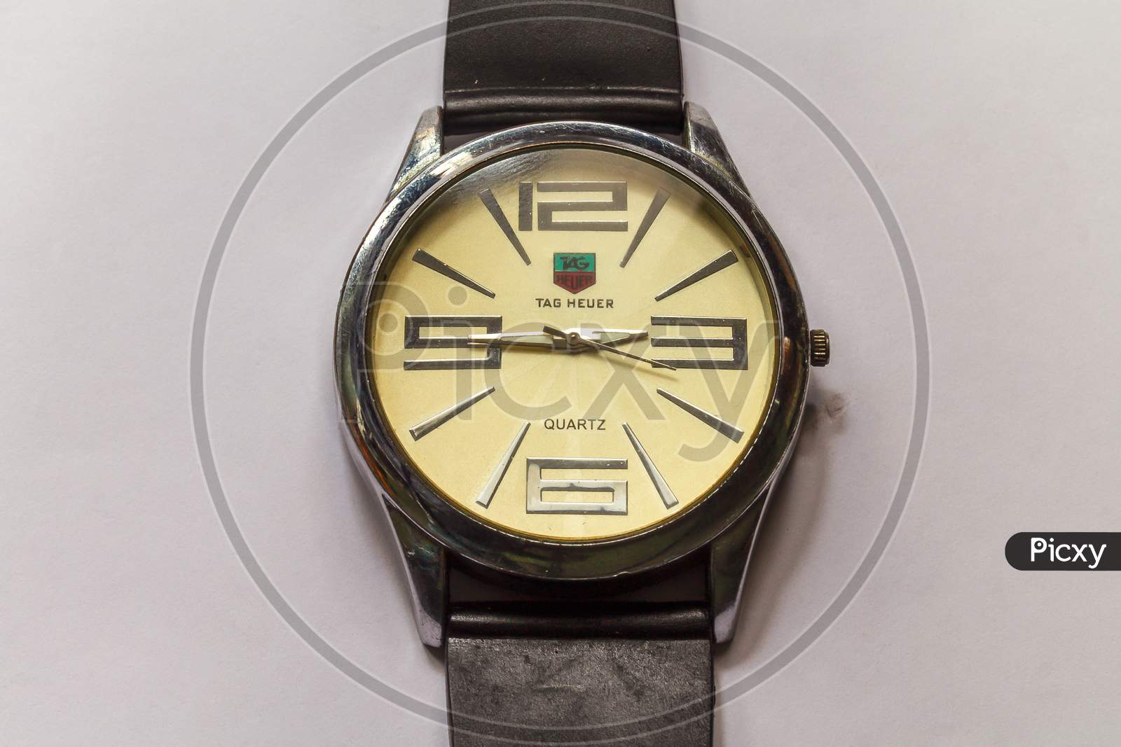 A View Of Men Wrist Watch Over White Background In Landscape Orientation
