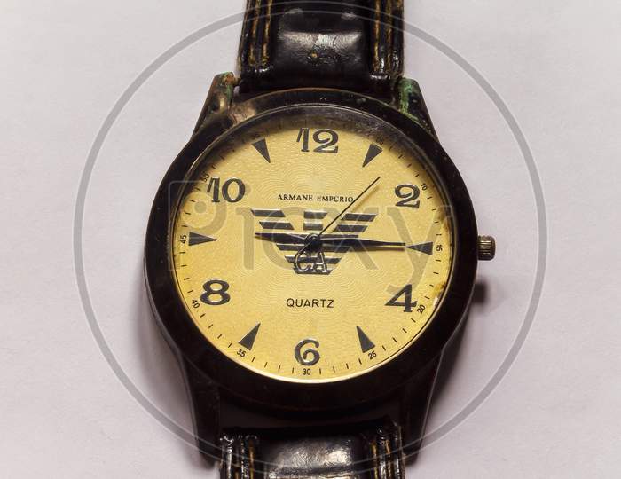 A View Of Men Wrist Watch Over White Background In Landscape Orientation