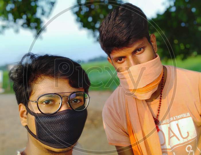 India village boys selfie wearing mask on face