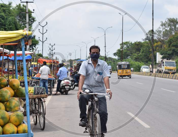 Hyderabad, Telangana, India. July-22-2020: Man Wearing Face Mask On The Road , Peoples Wearing Protective Face Mask At Road Side, Corona Pandemic Time
