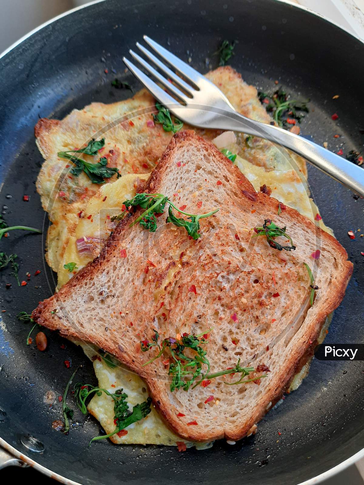 Bread Omelette Sandwich | Herbs | Chili Flakes