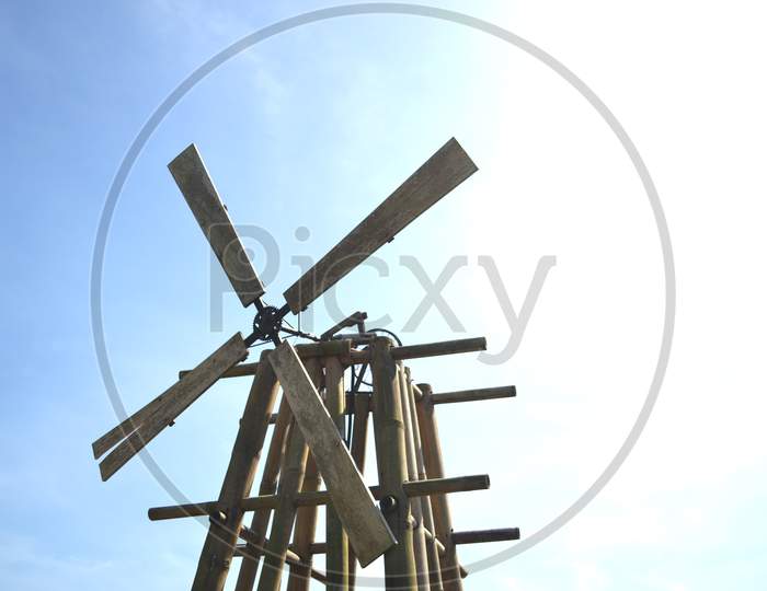 Old Wind Turbine From Wooden Generating Electricity