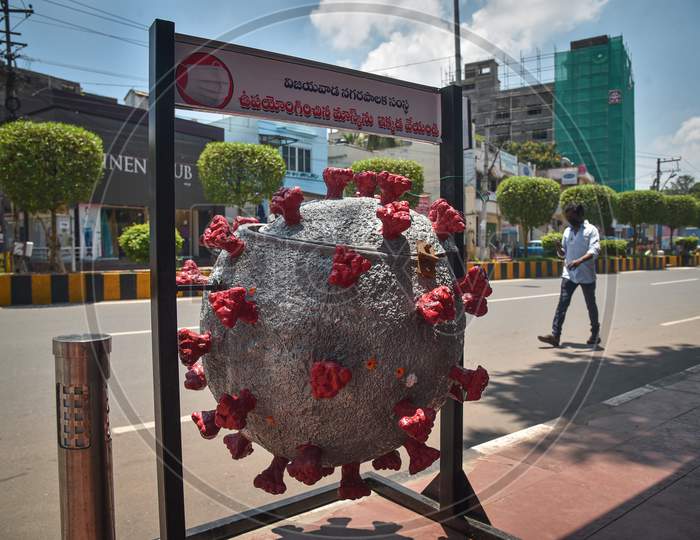 A Disposal Bin Representing Novel Coronavirus Is Placed On A Road By The Municipal Corporation To Create Awareness On Covid-19 Waste Disposals, At Mg Road, In Vijayawada.