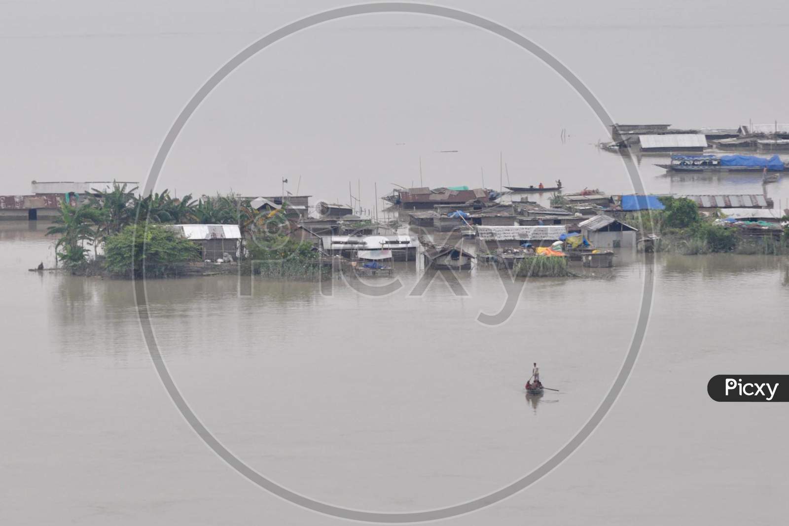 Partially Submerged Houses Are Seen At A Flood-Affected Village In Morigaon District In The Northeastern State Of Assam on July 26, 2020.