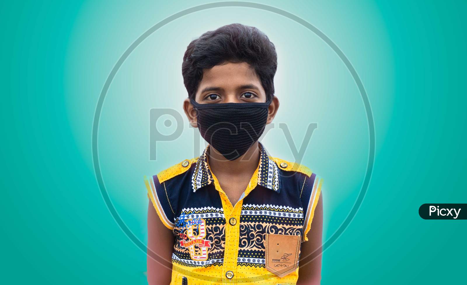KID WEARING MASK DURING THE COVID -19 PANDEMIC