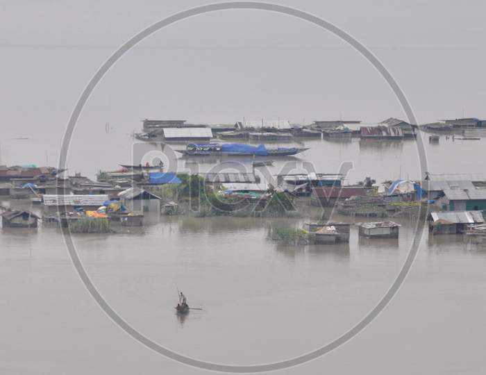 Partially Submerged Houses Are Seen At A Flood-Affected Village In Morigaon District In The Northeastern State Of Assam on July 26, 2020.