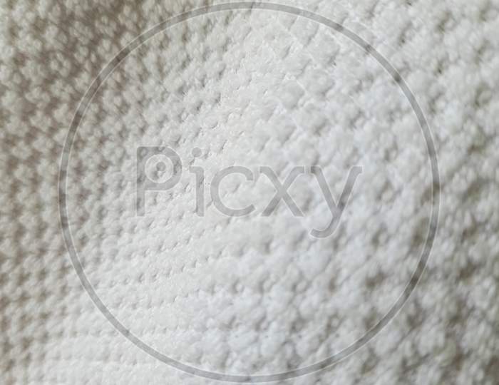 A grey fabric with textured pattern