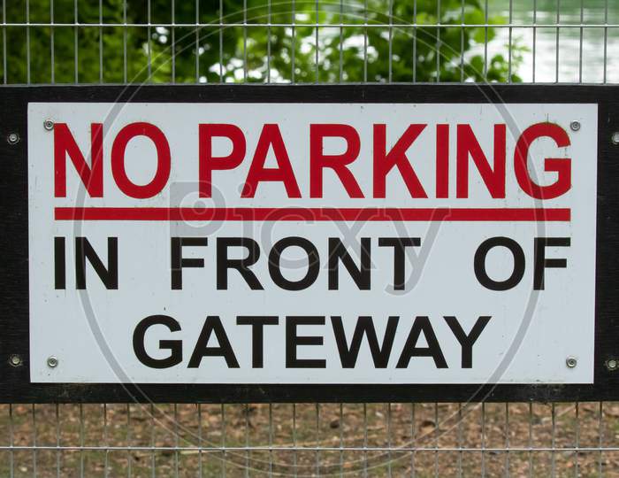 No Parking In Front Of Gateway Sign.