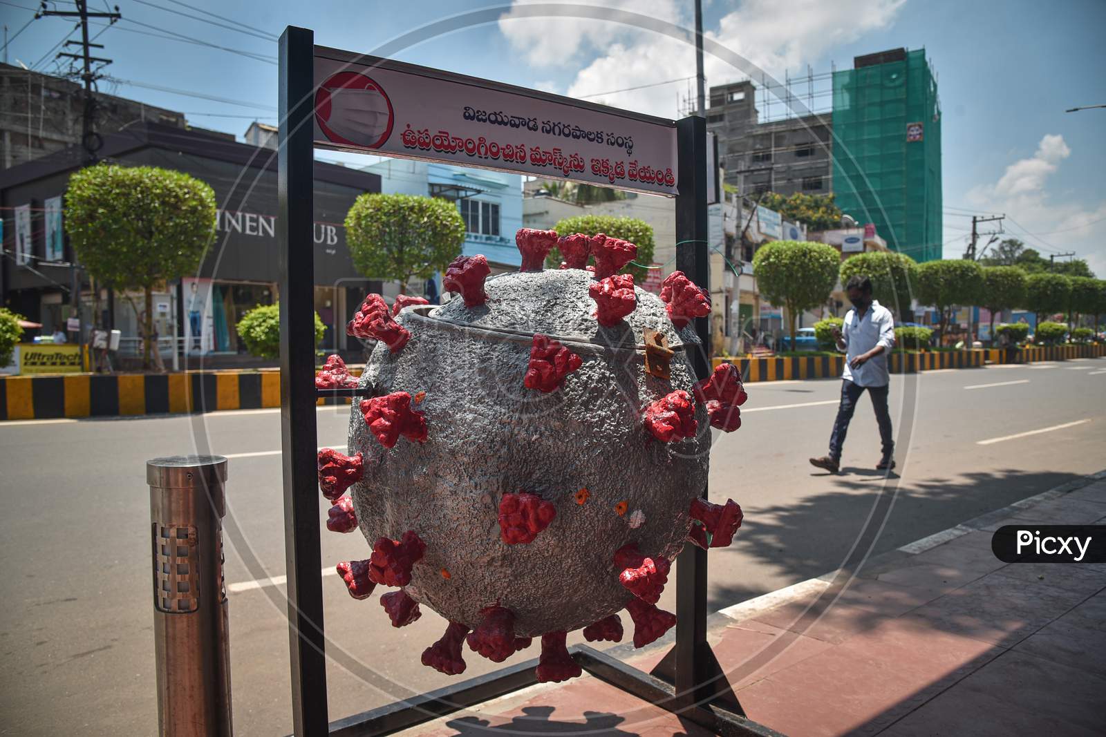 A Disposal Bin Representing Novel Coronavirus Is Placed On A Road By The Municipal Corporation To Create Awareness On Covid-19 Waste Disposals, At Mg Road, In Vijayawada.