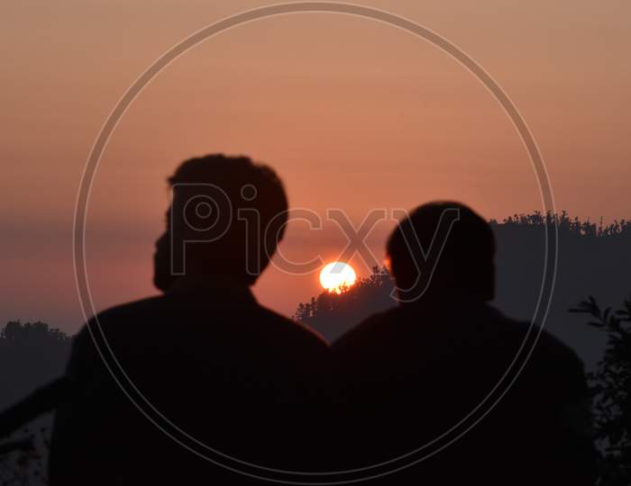 Beautiful Sunset And Two People In Nainital