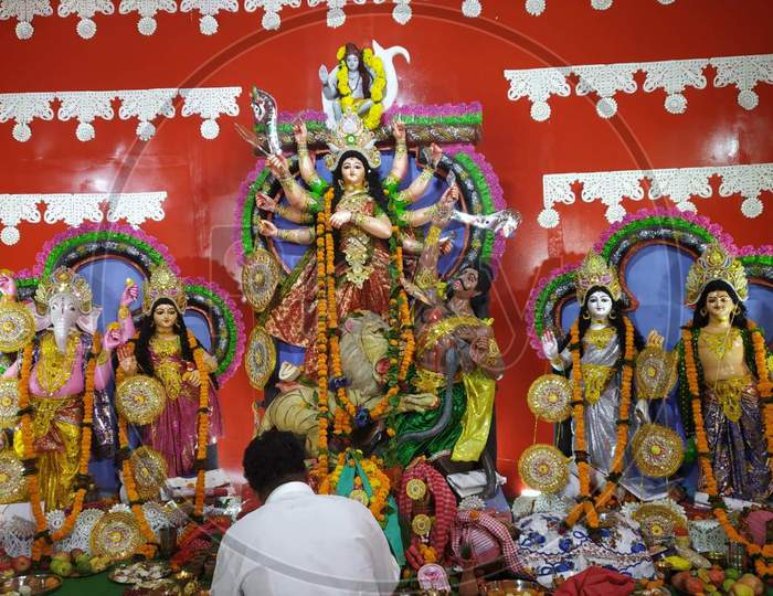 celebrating Durga Pooja at a pandal during navratras