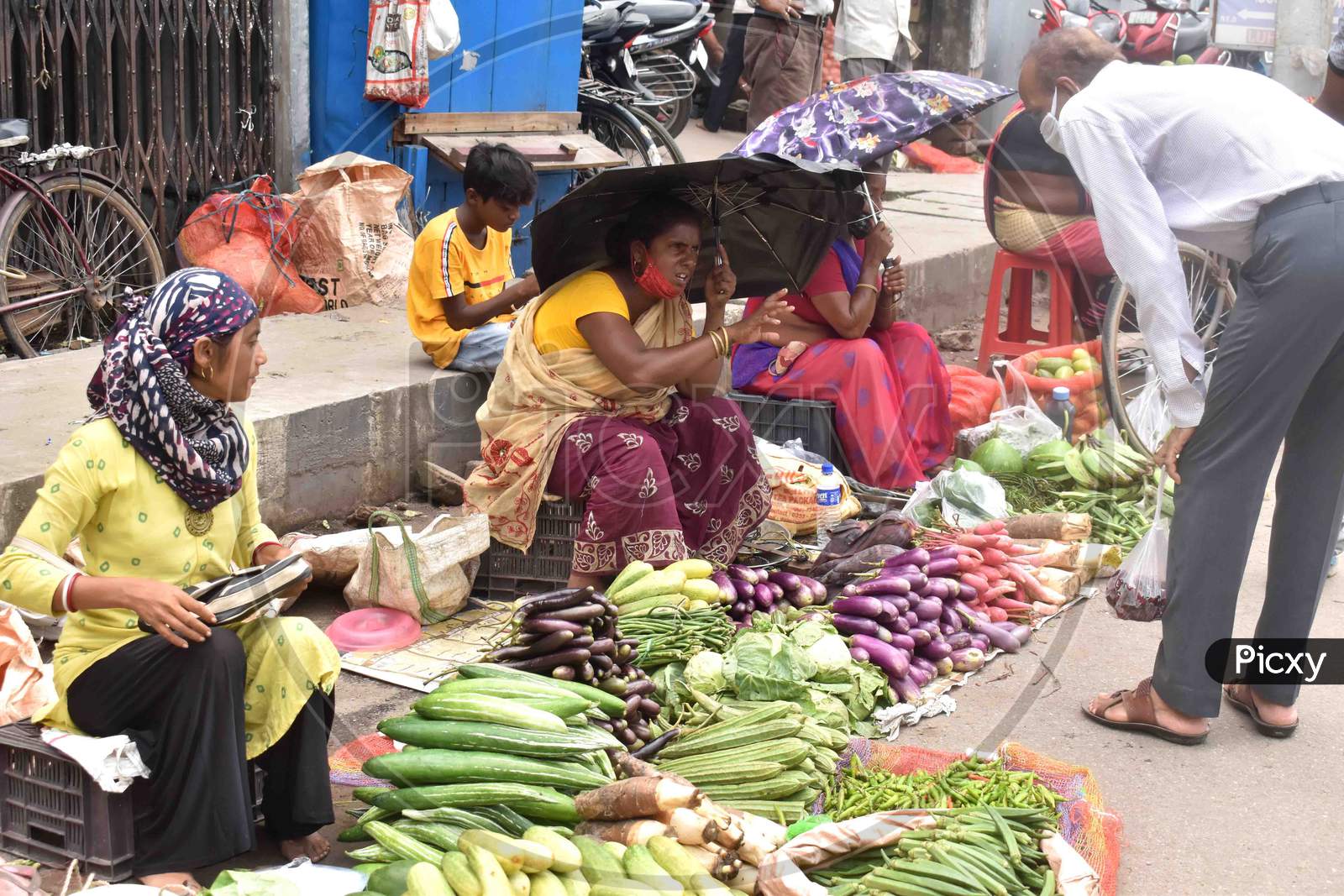 Vendors selling vegetables
