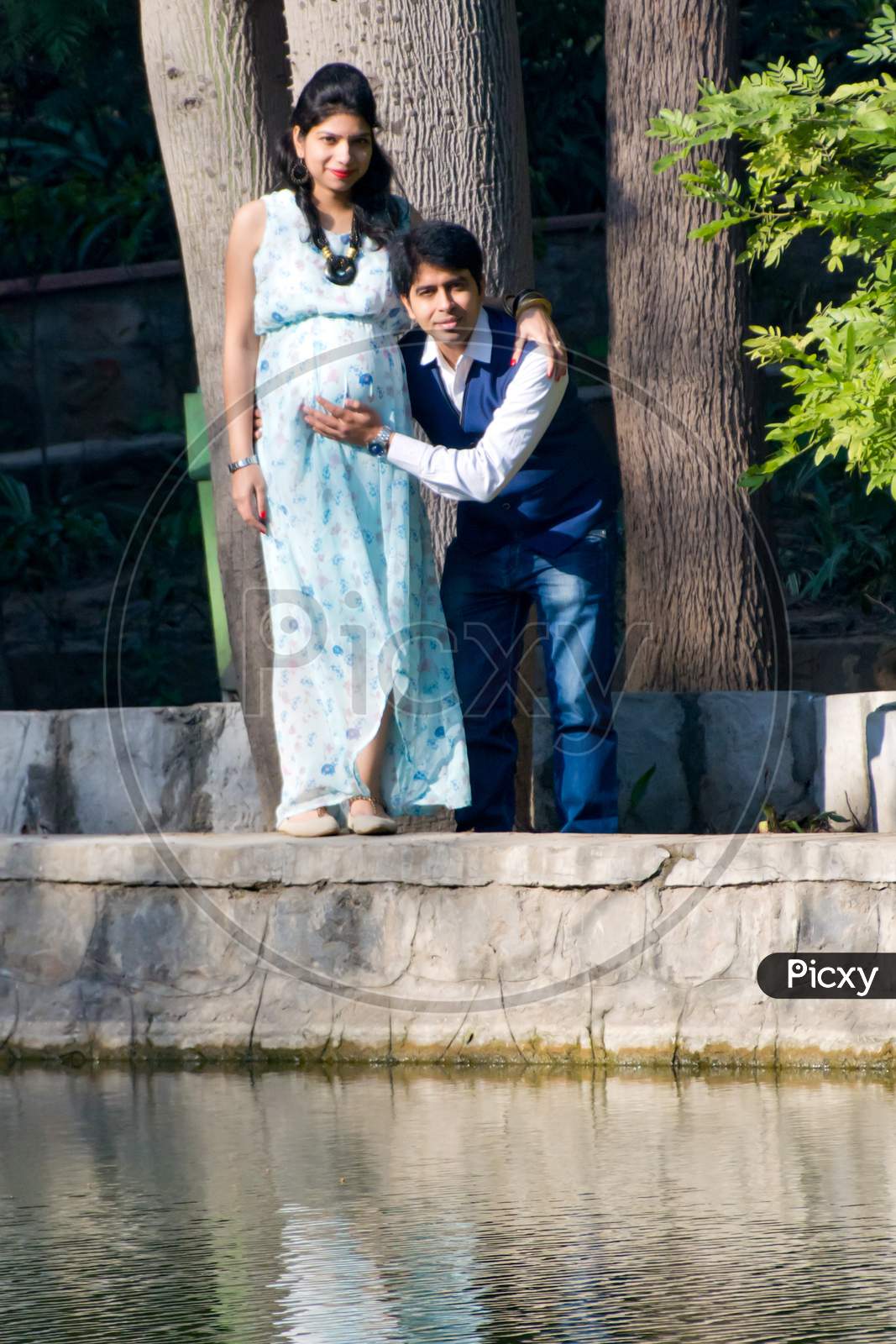 New Delhi India – March 3 2020 : Maternity shoot pose for welcoming new born baby in Lodhi Road in Delhi India, Maternity photo shoot done by parents for welcoming their child