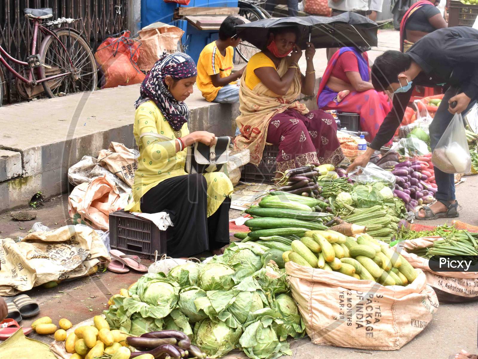 Vendors selling vegetables