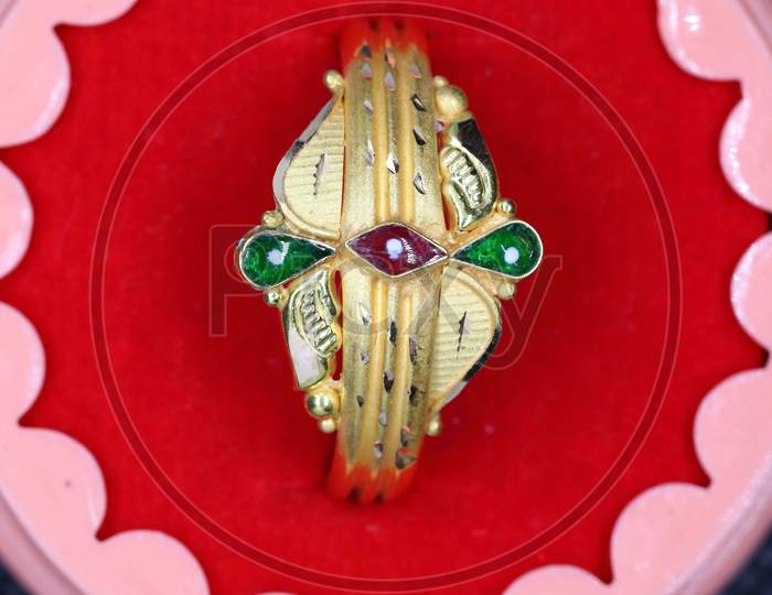 Gold Ring Colored In Red And Sky And Beautiful Attract Design For Girls