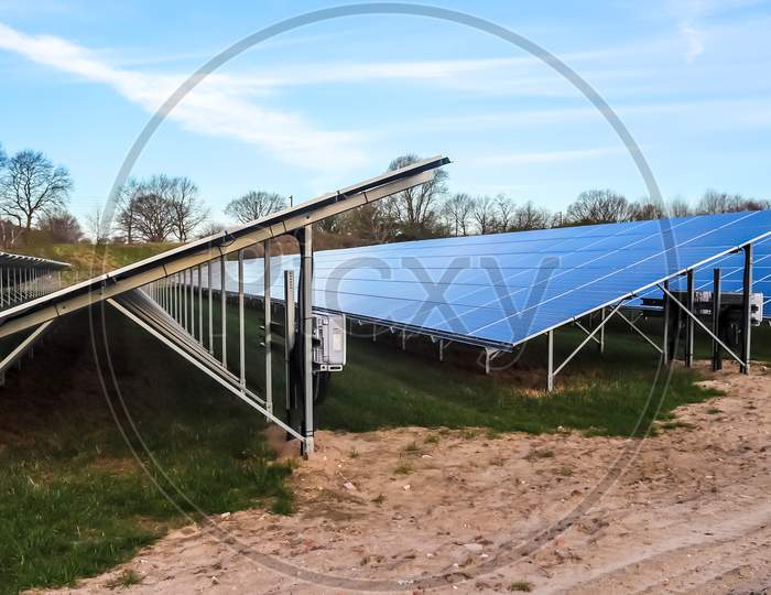 Generating clean energy with solar modules in a big park in northern Europe