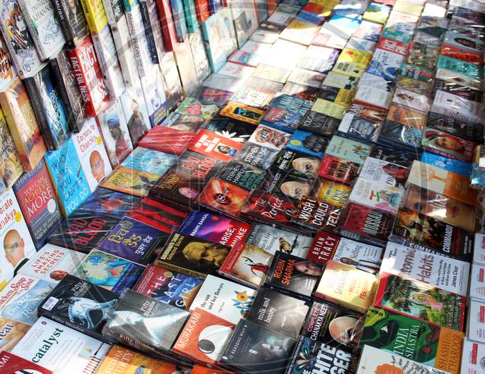 Variety of Books selling on a open shop at a busy market, at Esplanade, Kolkata.