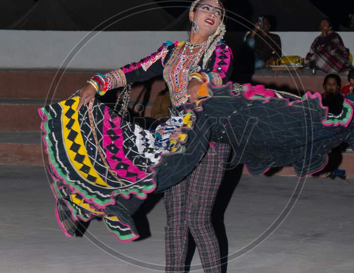 Indian female artist performing Kalbelia Folk Dance