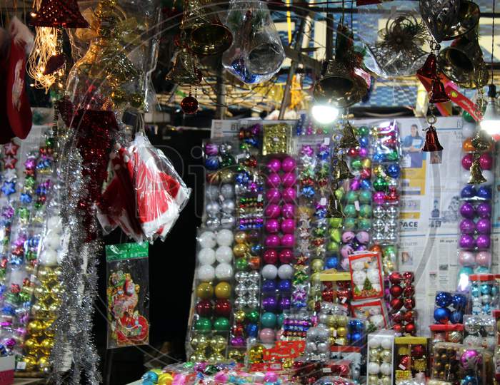Various colorful Christmas decoration selling on a open shop at market before Christmas at Esplanade, Kolkata.