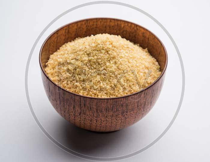 Bulgur, Dalia Or Daliya Or Broken Wheat Is A Raw Cereal Food From India, Served In A Bowl Or Spoon