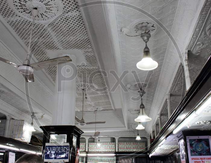 View of old ceiling interior of famous cake shop "NAHOUM's", at Dharmatala, Kolkata.