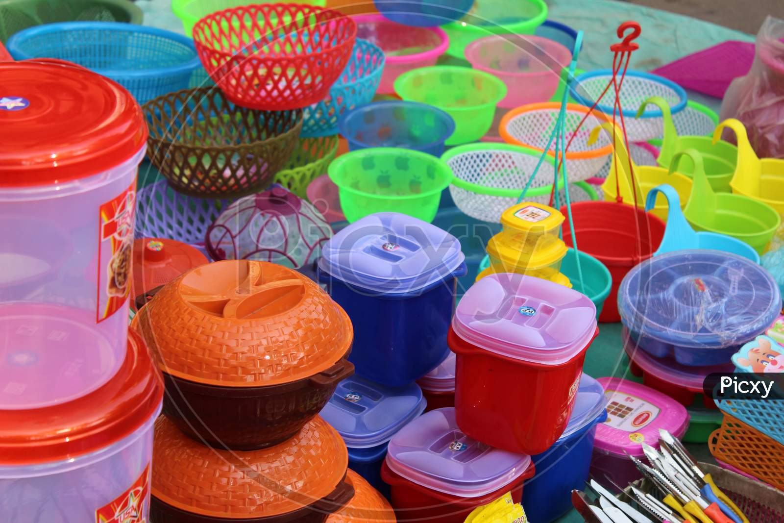 Colorful plastic made containers selling on a open shop at Dharmatala, Esplanade, Kolkata.