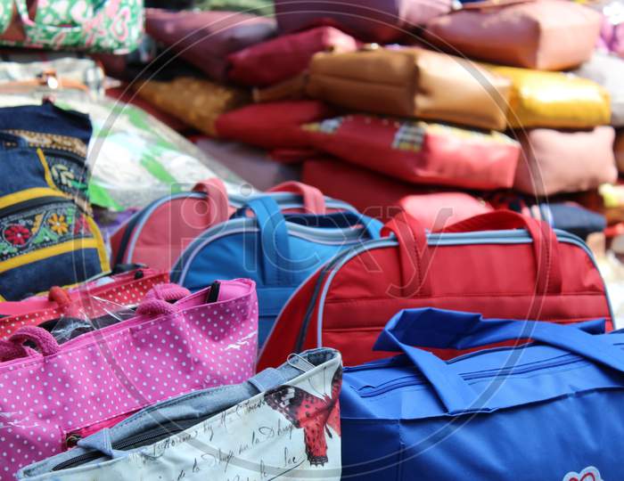 Variety of Bags selling on a open shop at a busy market, at Esplanade, Kolkata.