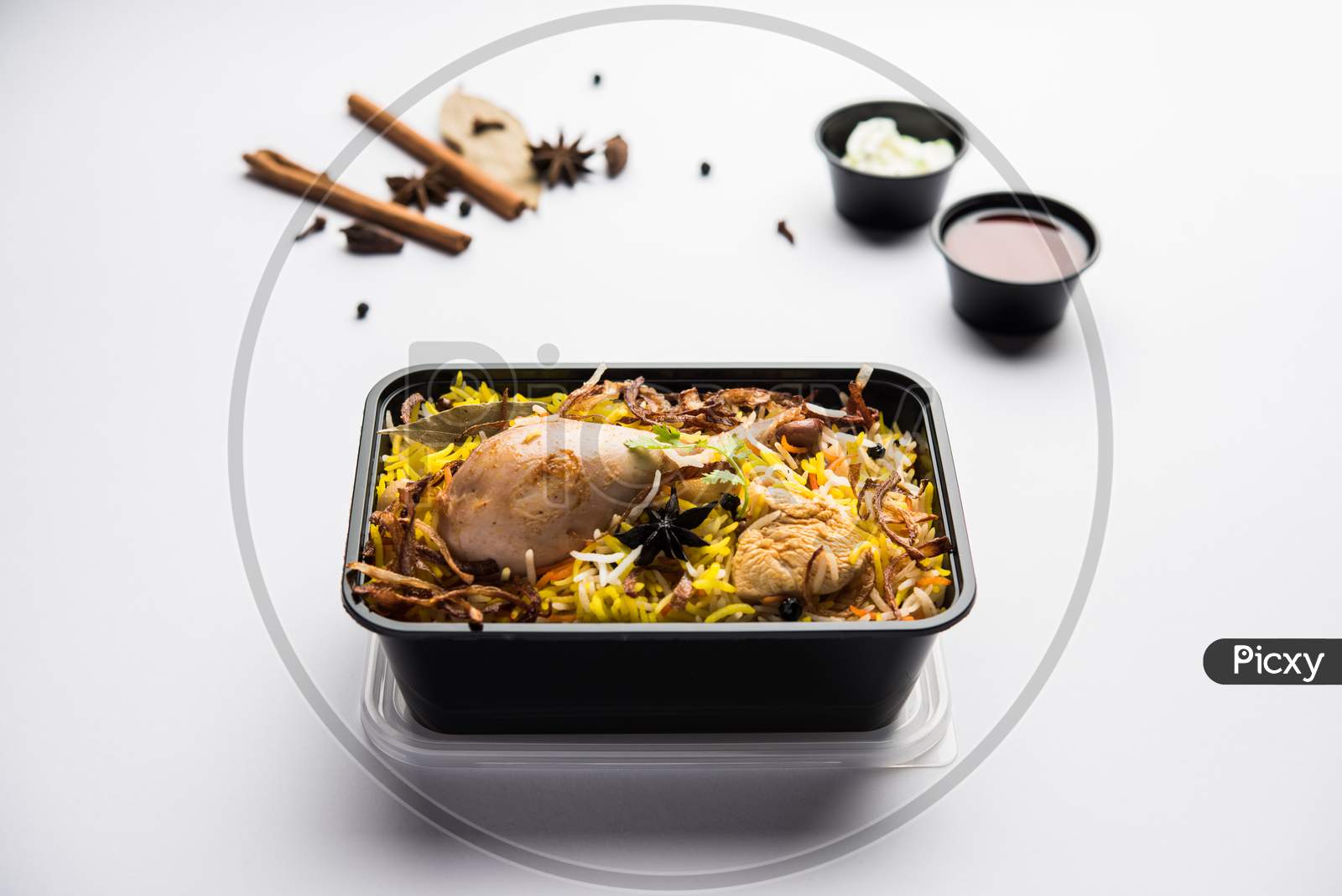 Chicken Biryani Is A Popular Non-Veg Food From India, Packed In Plastic Container