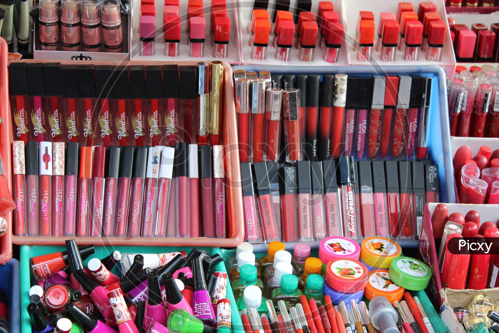 Variety of ladies cosmetics selling on a open shop at a busy market, at Esplanade, Kolkata.