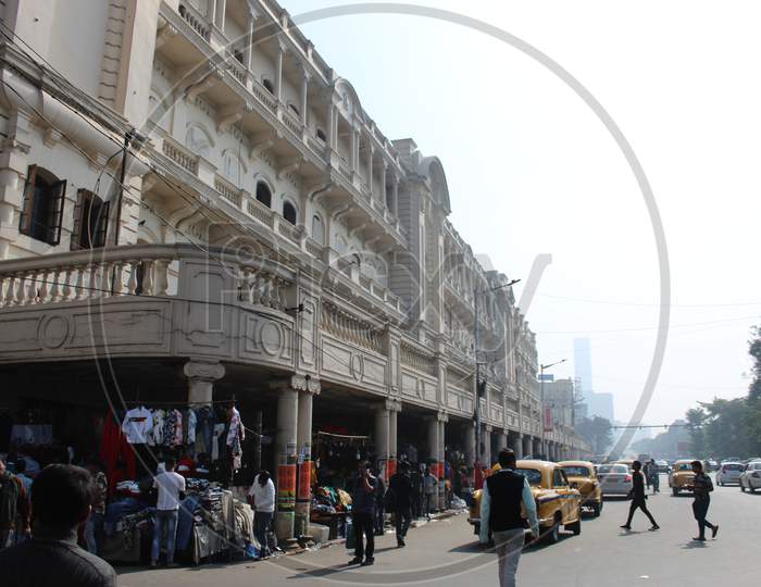 Cropped and partial view of famous `The Oberoi Grand` hotel and busy street, at Esplanade, Dharmatala, Kolkata.