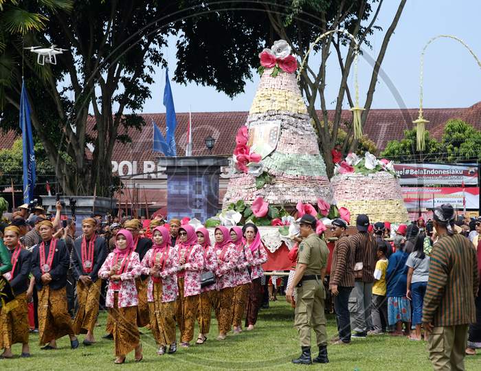 Gunungan Getuk traditional food made from cassava is paraded in the 1113th Anniversary of the City of Magelang
