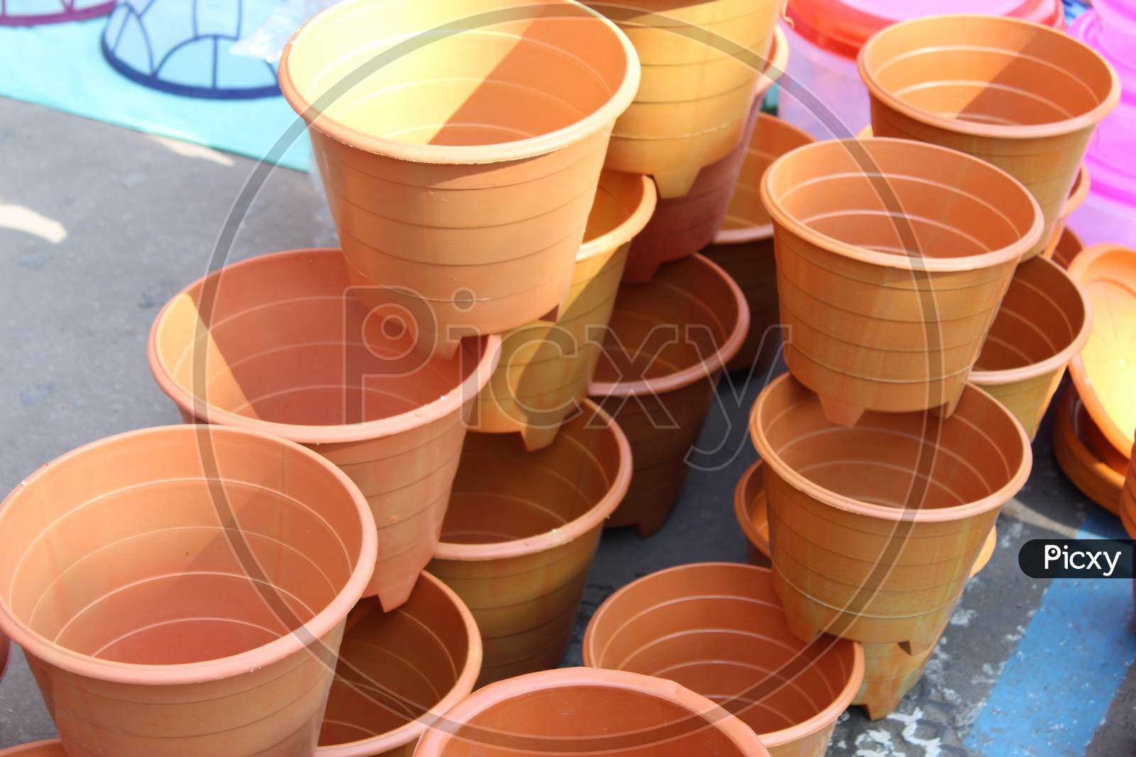 Plastic made container or pot or bucket for flowering purpose on sell.