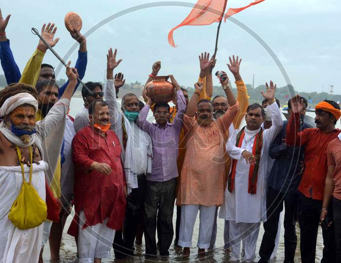 VHP workers carry holy water of Sangam in Prayagraj, which will be used in the foundation of laying ceremony of Ram Mandir in Ayodhya.