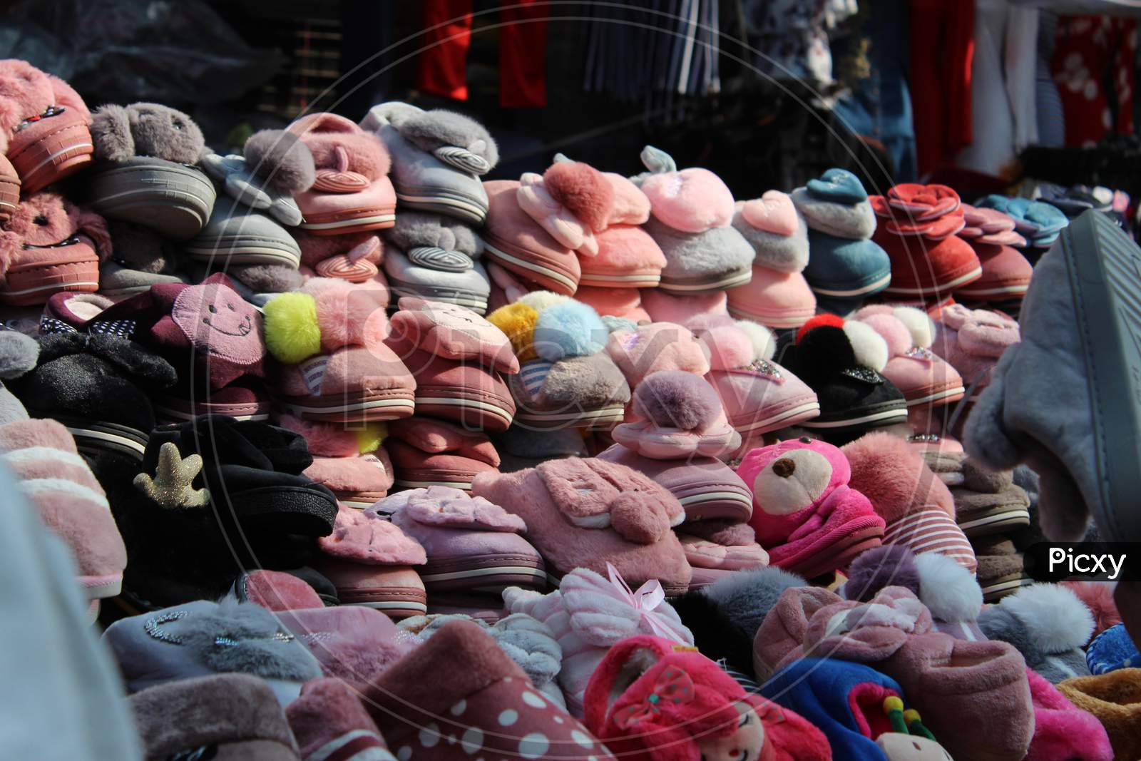 Colorful woolen slippers selling on a open shop at Dharmatala, New Market, Kolkata.
