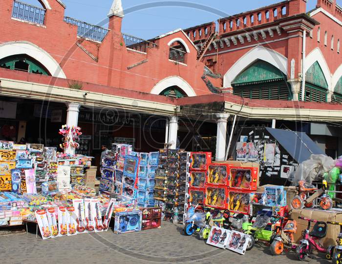 Open kids toy shop with colorful toys box in front of 'S. S. Hogg Market' at Esplanade, Kolkata 700069.
