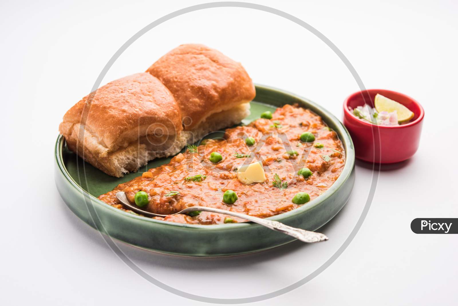 Pav Bhaji Is A Popular Indian Street Food That Consists Of A Spicy Mix Vegetable Mash & Soft Buns
