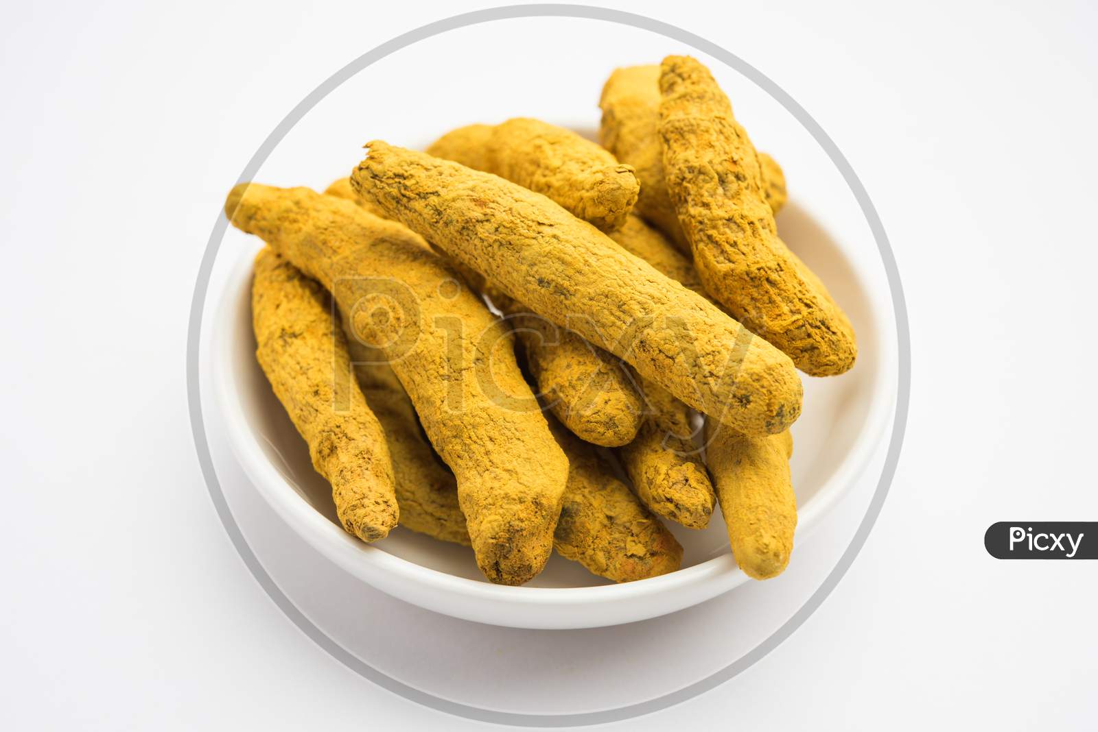 Haldi Or Dried Turmeric Roots As A Whole On White Background