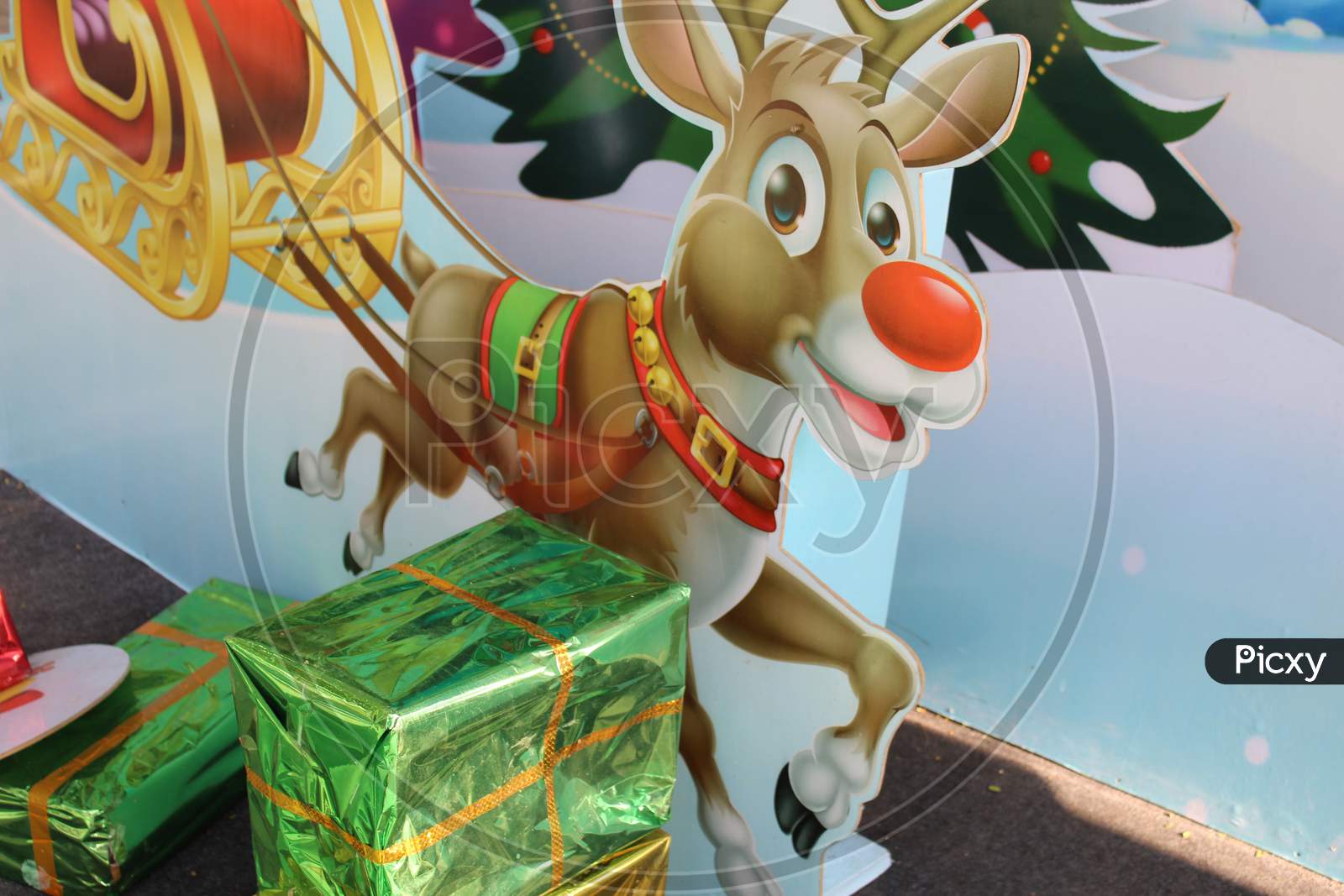 Cropped and partial view of Christmas deer and colorful gift boxes for Christmas decoration at Park Street,  Kolkata.