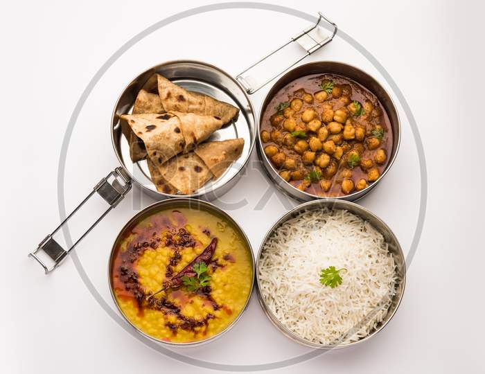 Indian Veg Lunchbox For Office Of Workplace With Chole, Dal Fry Rice And Chapati