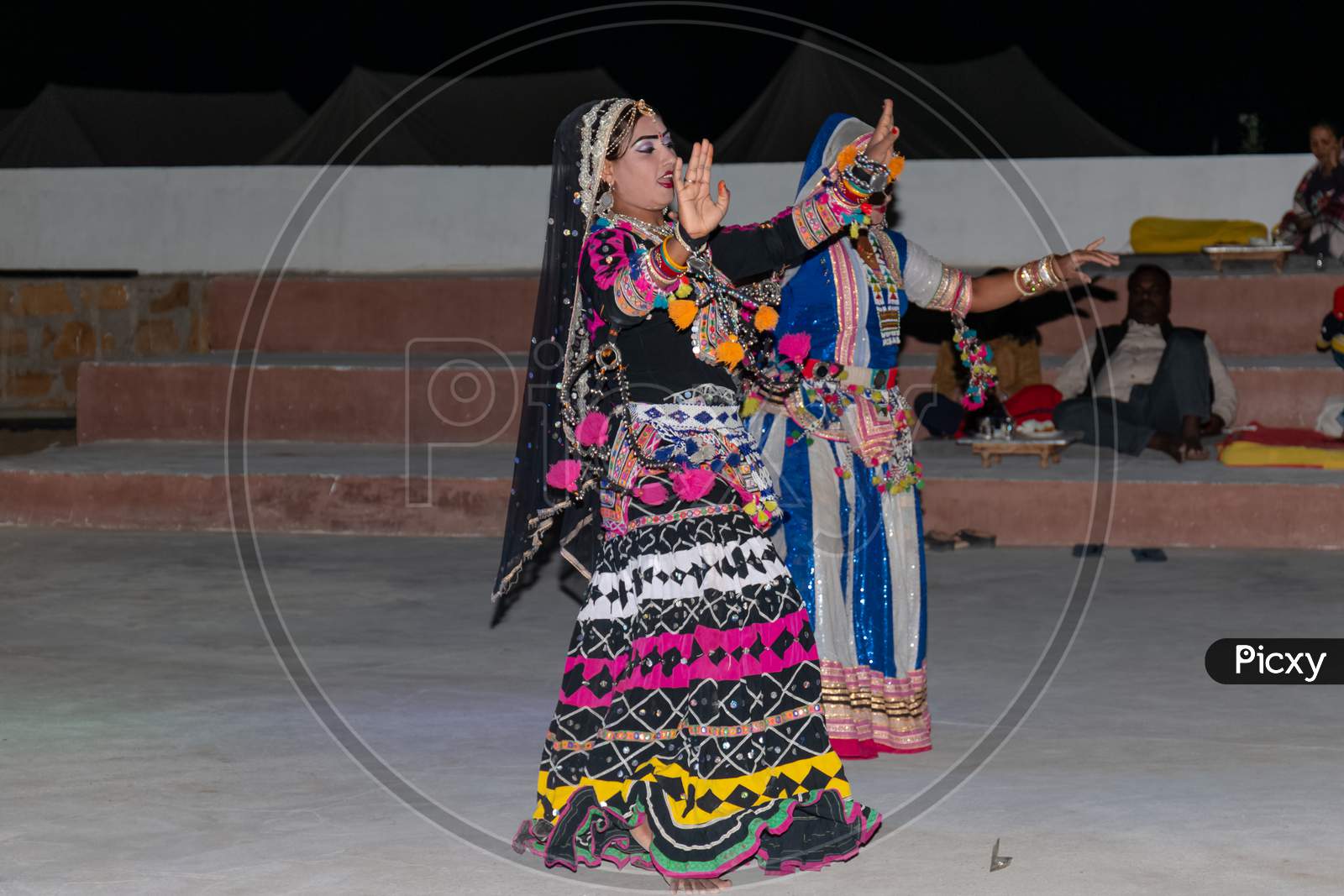 Indian female artist performing Kalbelia Folk Dance