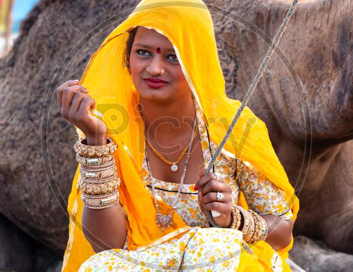 Indian Woman with Camel