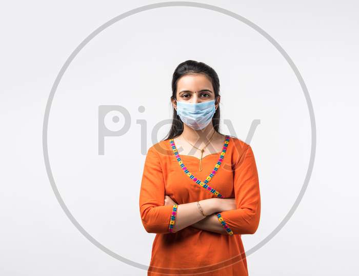 Beautiful Indian Woman Wearing A Protective Medical Mask Against Air Pollution And Covid-19