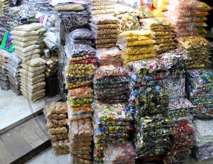 Various Chocolates and sweet Toffees and Candies selling in bulk at a open shop at Dharmatala, Kolkata.