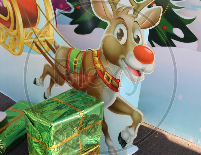 Cropped and partial view of Christmas deer and colorful gift boxes for Christmas decoration at Park Street,  Kolkata.