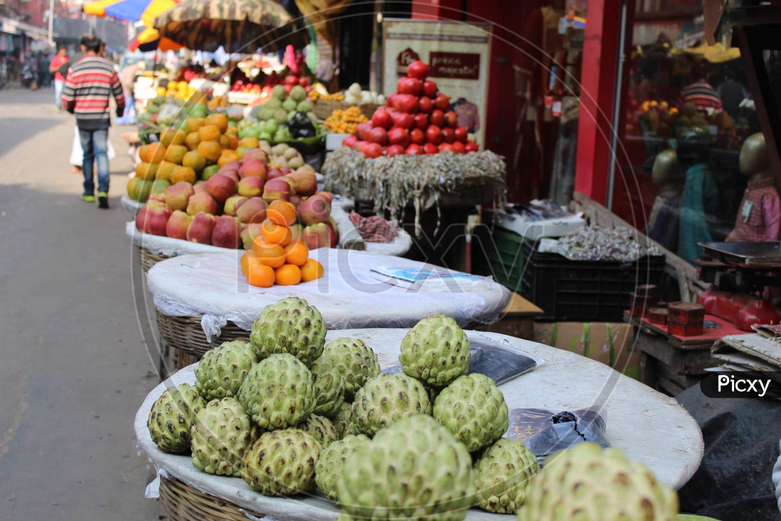 Fruits selling on a open shop at a busy market, at Esplanade East, Kolkata 700069.