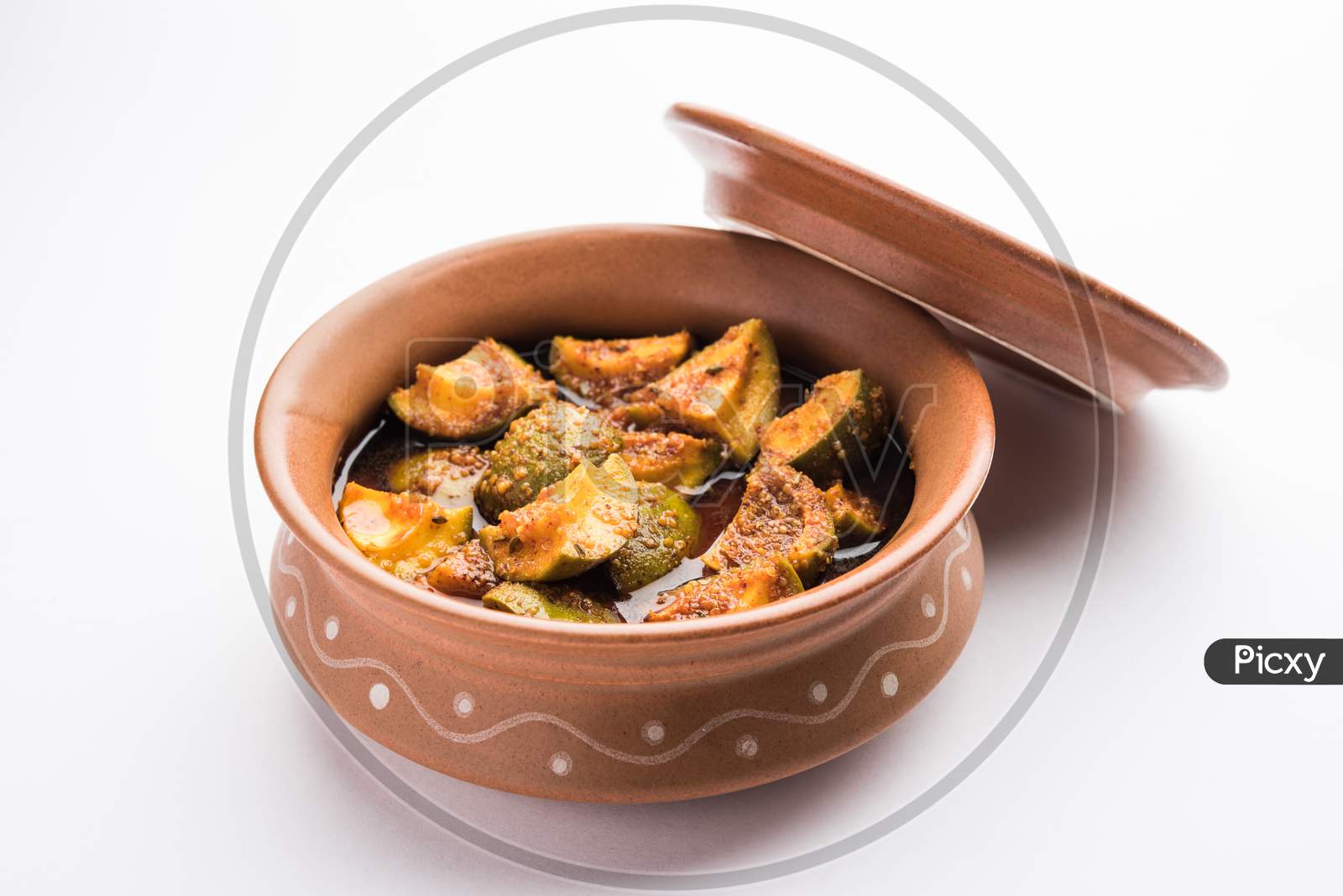Indian Homemade Raw Mango Pickle Or Aam Ka Achar Or Kairi Loncha In A Bowl